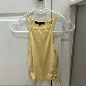 Medium yellow crop with ties on side